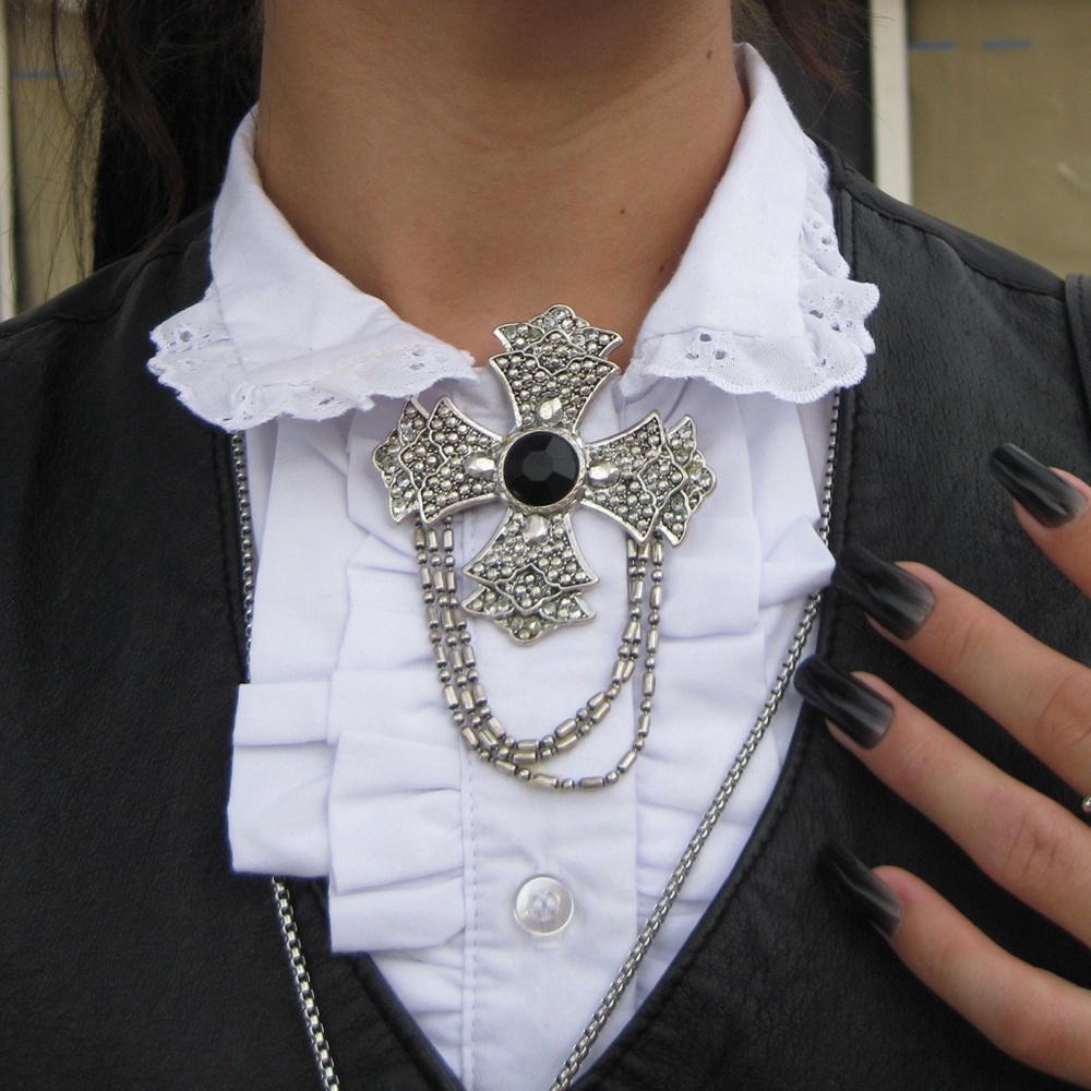 Cross brooch
